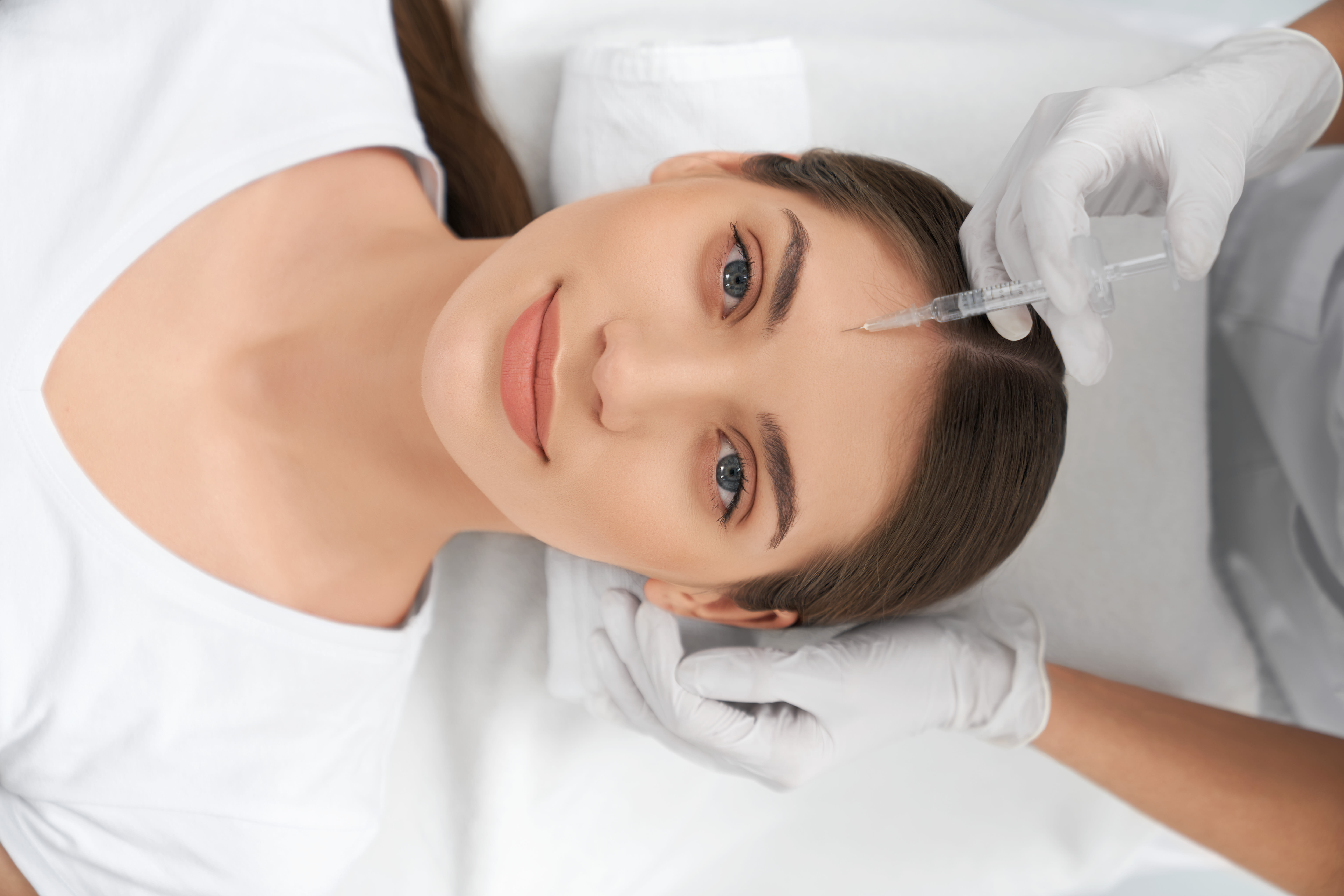 Woman receiving Face PRP treatment at Dr. Saiqa Aesthetics clinic in Islamabad